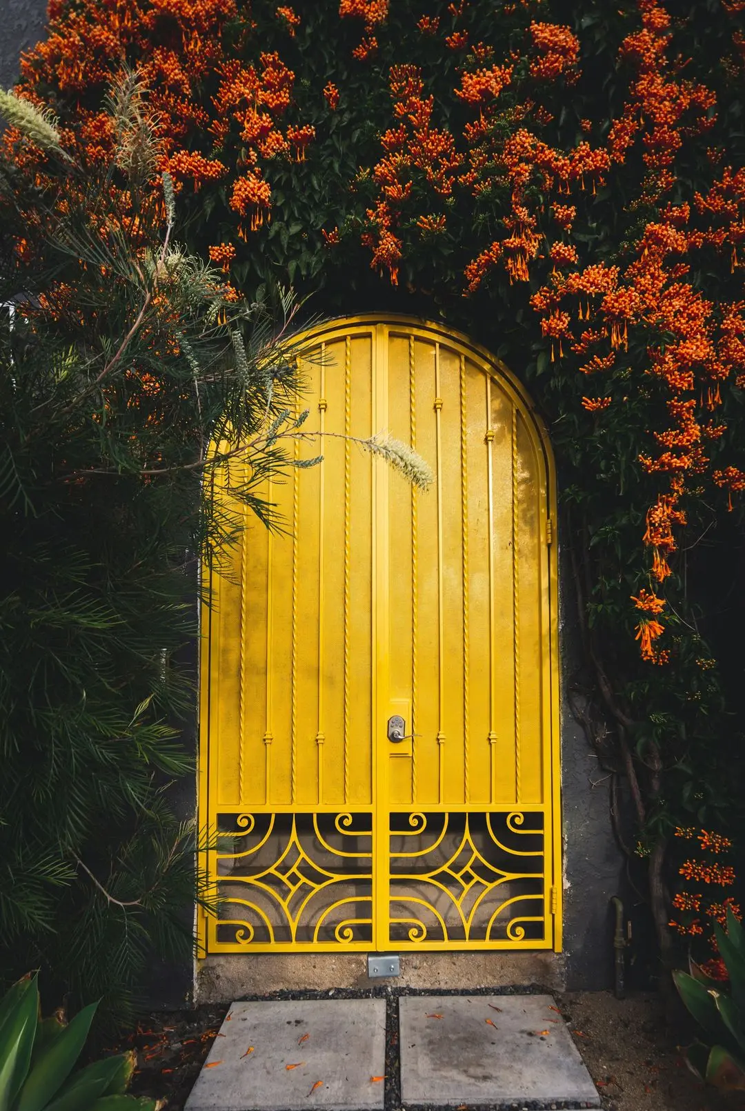 yellow metal door close-up photography